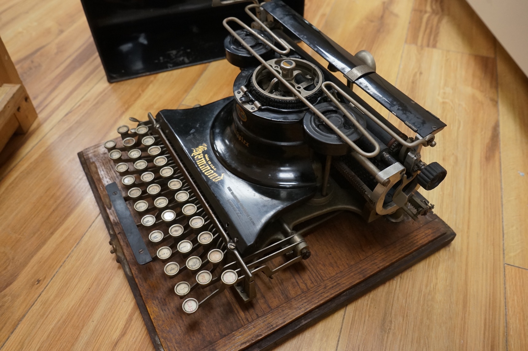 An early 20th century oak and tinplate Hammond Multiplex typewriter, Made in U.S.A.